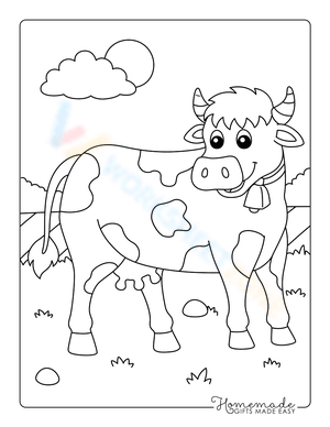 Cow standing on Grass