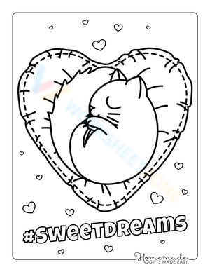 Cute cat on heart cushion